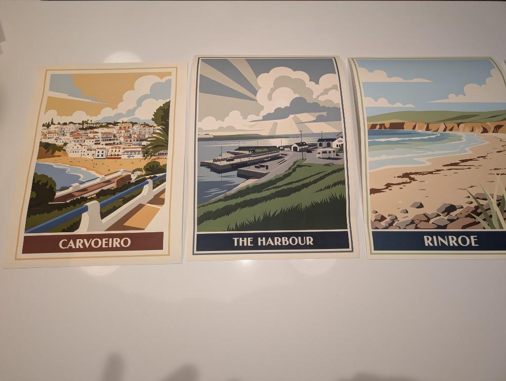 Three finished RetroRoam prints laid out on a table